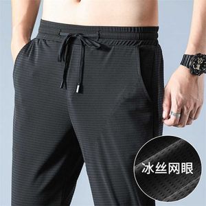Lato Ultra-Thin Ice Silk Nine-Point Spodnie Casual Spodnie Męskie Trend Luźne Szybkoschnięte Sporty Spodnie Spodnie 211112