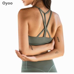 Odzież siłownia Oyoo Strappy Push Up Sports Bra Dla Kobiet Sexy Trening Bieg Bras Crisscross Back Medium Support Yoga z wyjmowanymi kubkami