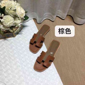 h Women Slippers Wear Fashion Net Red Flat Bottomed Travel and Vacation Beach Shoes in Summer. One Word Leather Sandals