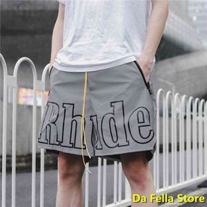 Rhude Shorts Designer Grey Color Men Mężczyzn Kobiet Odblaskowy efekt wewnątrz Tag Us/UE Rozmiar wielkości Kolan Kopanie UK X1116 Wysoka jakość