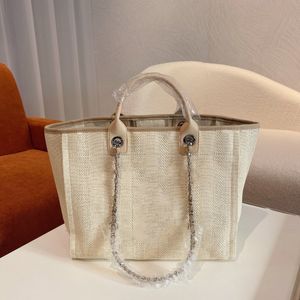 كلاسيكي على الطراز الكلاسيكي Canvas Beach Shopping Bag Womens Luxury Designer Deauville Chain Tous Double Toulder Trace Party Girls Cartripe Stripe 37*15*30cm