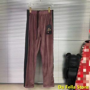 Calças de agulhas vermelhas 20ss homens mulheres agulhas calças de veludo alta qualidade borboleta bordado sweatpants retalhos calçast220716