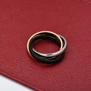 'Gold Silver Black' três anéis cruzados anéis triplos para mulheres, homens, amantes, aliança de casamento de aço titânio 316L Aneis Anel Bague Femme Anel de designer de design original