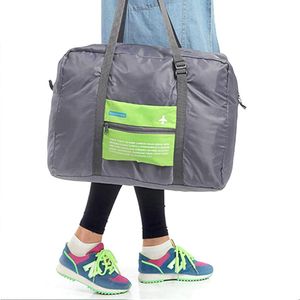 Brieftaschen, die große Kapazitäts-Flugzeug-Trolley-Reise-Aufbewahrungstasche Walker verkaufen, koreanische Version von Oxford-Tuch-Falttasche