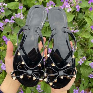 Moda mulher flip flops shoes de verão fresco beach rebites big bow liso sandálias marca geléia sapatos tamanho meninas tamanho