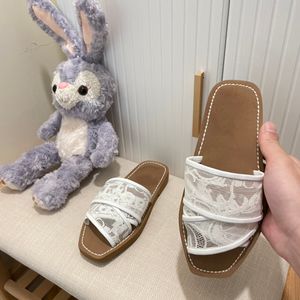 2022 Ladies Summer Sandals New Slippers 레이스 자수 크로스 플랫 비치 슬리퍼 플립 플롭