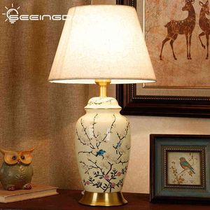 Nowa ceramiczna lampa stołowa w stylu chińskiego do salonu sypialnia sypialnia Święta Ręcznie malowana retro w stylu chińskim lampa dekoracyjna H220423