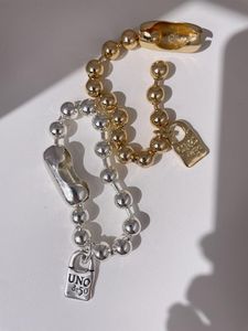 Bracciale rigido in metallo braccialetto esagerato ciondolo con lucchetto in oro perline accessori di gioielli di tendenza della moda per le donneBraccialetto