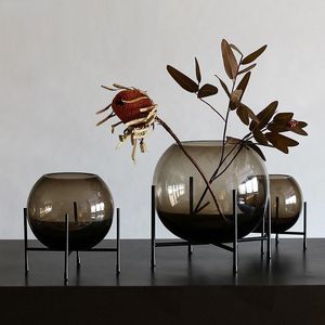 花のオフィスの机の装飾のための花瓶丸勾配のガラス花瓶の鉄の括弧透明な水耕木の花挿入家の装飾