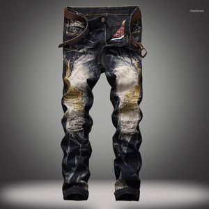 Jeans för män 1J Mode Europeiskt och Amerikanskt Street Personlig broderade vingbyxor, grossistanpassade