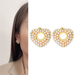 De nya populära örhängen för kvinnor Guldfärg charms stud lyxkvalitet koreansk mode indisk örhänge julkamera kvinnliga smycken 2022 smycken tillbehör