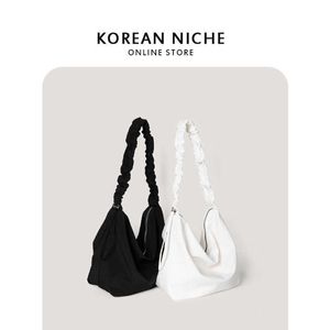 Saco feminino 2021 novo design minoritário coreano grande capacidade único bolsa de ombro simples e versátil insensivo plissado