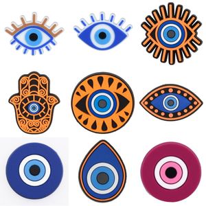 1st Cartoon Evil Eye Croc Charms PVC Shoe Decorations For Clogs Sandaler Armband Armband Tillbehör unisex Kids Party Gifts