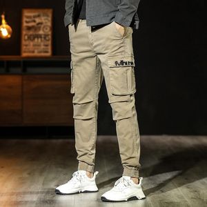 Herr jeans streetwear mode män stora fickbroderi designer elastiska casual lastbyxor overall hip hop joggar byxor