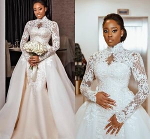 2022 Sexy African Champagne Mermaid Wedding Dresses High Neck Illusion Lace Appliques Tulle Long Sleeves Detachable Train Overskirts Muslim Formal Bridal Gowns