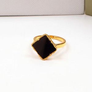 3 cores de alta qualidade feminino banda de designer anéis de ouro banhado a quatro folhas de titânio anel de anel de anel de anel de moda jóia lady fester presentes por atacado