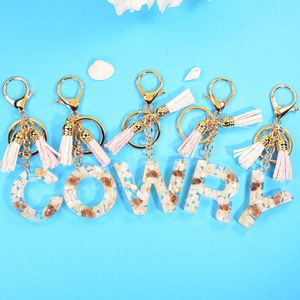 Fashion Conch 26 A-Z Letter Keychain med Tassel Creative Initial Alfabet Key Ring for Women Trendy Bag Pendant Accessories Gift