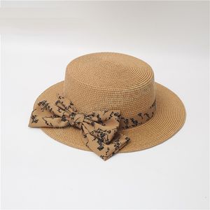 Raffia bred grim båge halm hatt sommar sol hattar för kvinnor med fritid strand cap lady platt gorras