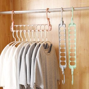 Hängande rack hänger garderob torkning av plast hushåll förvaring rack fällande nio håls multifunktionell