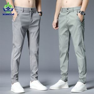 Lato Cienkie spodnie Casual Mężczyźni 4 Kolory Classic Style Moda Biznes Slim Fit Proste Bawełniane Color Color Marka Spodnie 38 220325