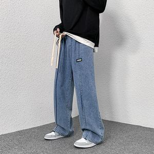 M￤n jeans v￥ren m￤n elastisk midja high street denim byxor rakt l￶st manlig all-match baggy retro fritid cowboy byxor