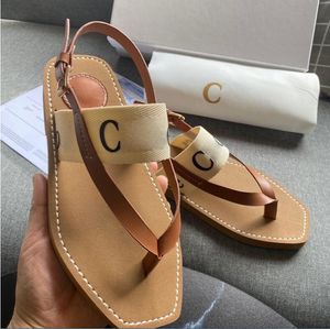 001 Tasarımcı Ahşap Tuval Terlik Yaz Plajı Sandalet Kapalı Ayakkabı Çapraz Dokuma Açık Açık Ayak Parmağı Sözleri Moda Sandal Boyutları 35-42