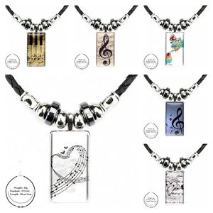Wholesale unique womens gifts resale online - Pendant Necklaces Old Musical Note Music For Christmas Gift Unique Fashion Glass Cabochon Black Hematite Necklace With Women Statement