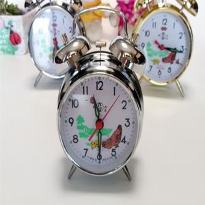 Modern mechanical alarm clock manually winding silver color good quality k