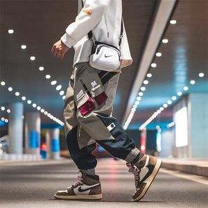 Calças de carga dos homens de Houzhou para homens Harajuku Calças Masculinos Loose Coreano Streetwear Hip Hop Japonês 5XL Bolso Spled 220325