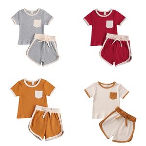 赤ちゃんの夏の服の子供2ピースribed衣装セット半袖ポケットトップショーツ