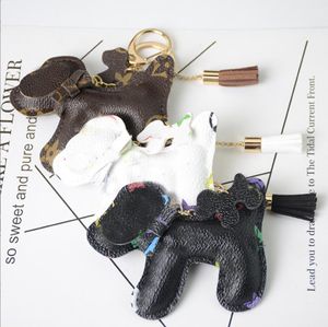 Wholesale crystal cartoon resale online - 6 Style Cute Dog Design Grid Print Car Keychain Bag Pendant Charm Jewelry Flower Key Ring Holder for Women Men Fashion PU Leather Animal Tassels Key Chain Accessories