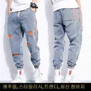 Mode rippade jeans för män 2020 nya fyra säsong lösa harem jeans streetwear hip-hop stil hål byxor elastiska midja byxor g0104