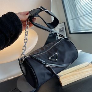 Handväska enkel fritid cylindrisk liten väska kvinnor 2023 nya kedja sling en axel personlig blixtlås messenger
