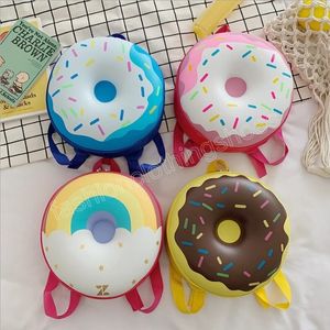 Cartoon Donut Small Mackpack na versão coreana do jardim de infância fofa infantil garoto de menino garoto de ombro de moda