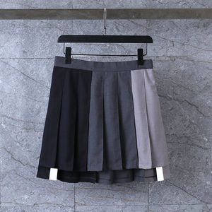 Mode Klänningar Design Kvinnor Mini Skirt Lossa Casual Plisserade Kjolar Sexiga Tjejer Hip Wrap Kjol Cheerleading Performance Dress