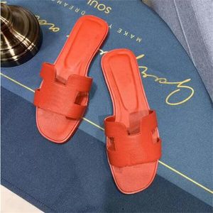 Designer Flat Slide Sandal Women Heel Slipper Ladies äkta kalvskinn skor mode Luxurys utomhus svart strandlägenheter toppkvalitet