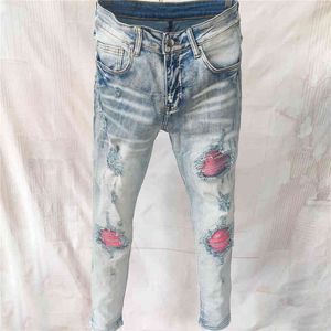 Light Blue Street Retro Strappato Cuciture Jeans Uomo Pantaloni Moto Uomo Punk Jeans Hip Hop Strappato Designer Jeans Impilati Per Uomo T220803