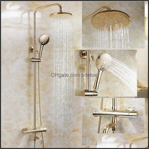 Guldfärg badrum termostatisk kontroll dusch kran uppsättning väggmonterad rund design regn huvud mässing material droppleverans 2021 uppsättningar kran