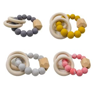 Nuovi massaggiagengive ad anello in legno naturale per accessori per la cura del bambino Dita per bambini Giocattoli per esercizi Ciuccio colorato con perline in silicone