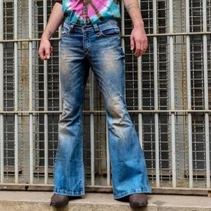 Jeans da uomo 2022 Designer Punk Stlye Bell Bottom Denim Pantaloni da uomo svasati larghi pantaloni gamba bootcut patchwork afflitto