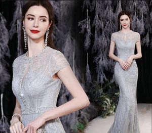 2022 Seksowne srebrne szare sukienki wieczorowe Sheer szyi koronkowe z koralikami Temperament Syrenka formalne sukienki na bal maturalne