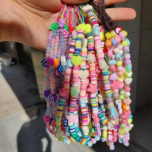 Chaveiros Cadeia de telefone Correia com miçangas Pulso Estojo para celular Cordão de cerâmica macia Correntes de flores Amuleto de estrela Olho maligno Jóias ChaveiroChaves Chaveiro