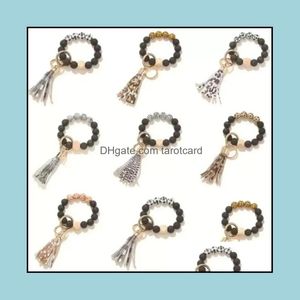 Moda Rosted Bead de Madeira Pulseira Keychain Festa Favor Padrão Tassel Pingente Pulseiras Mulheres Menina Chave Chave Strap 7 Cores Drop Deli