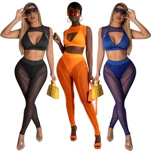 2022 Sexy Mesh Se igenom TrackSuits för Kvinnor Solid Bröst Wrap Ärmlös Grödoppar och Slim Splice Pants 2 Piece Sets x1182
