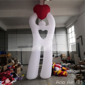 Proposta de 3m/4m/5m h Man, segurando o coração vermelho inflável com o soprador de ar para a decoração do Dia dos Namorados feita na China