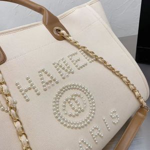 العلامة التجارية الفاخرة الكلاسيكية CH Beach Bags Canvas Pearl Peening Bag Designer التسوق المحمول سعة كبيرة حقيبة اليد حقائب اليد العلامات على حقيبة الظهر Ladies Satchel Z6HM