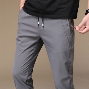 Summer Men Spanty ciepłe cienkie spodnie luźne sprężyste spodnie talii Spodnie Spodnie Duże plus rozmiar 38 201126