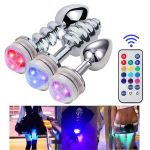 Fulgor de massagem no plugue escuro com led Anal Plug Light Vagina Decoração Sex Toys Luminous Anal Cauda ButtPlug Aço Inoxidável