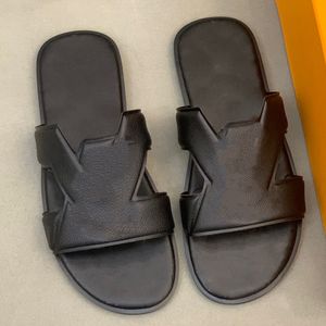 OASIS MULES SANDALS This shoe features the brands signature embossed pattern on comfortable leather insole It features a soft outsole designer slippers