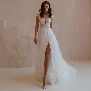 Andra bröllopsklänningar Elegant sidoslits tyll spets sexiga v-ringar applikationer mössa ärm i rygglös sveptåg vit brudklänning annan
